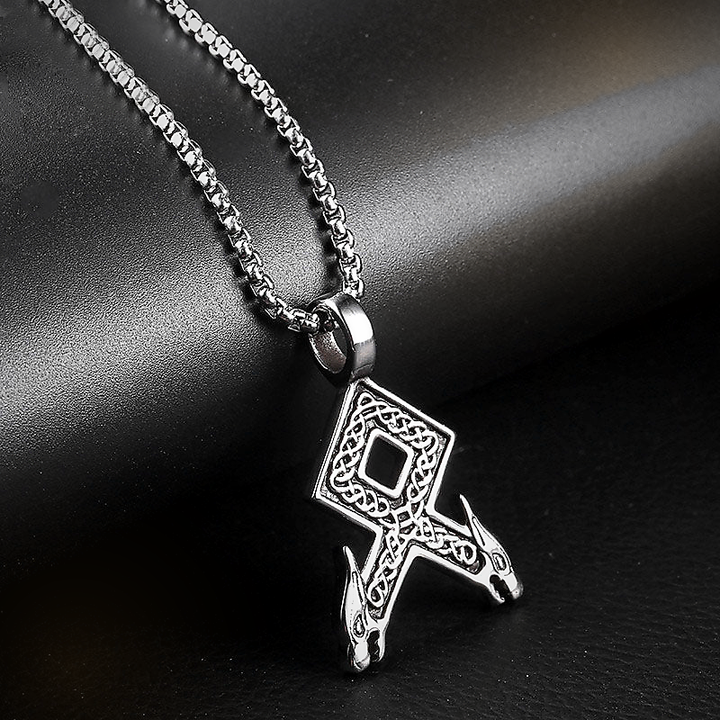 Vegvisir Path minimal Viking rune necklace on dark leather background